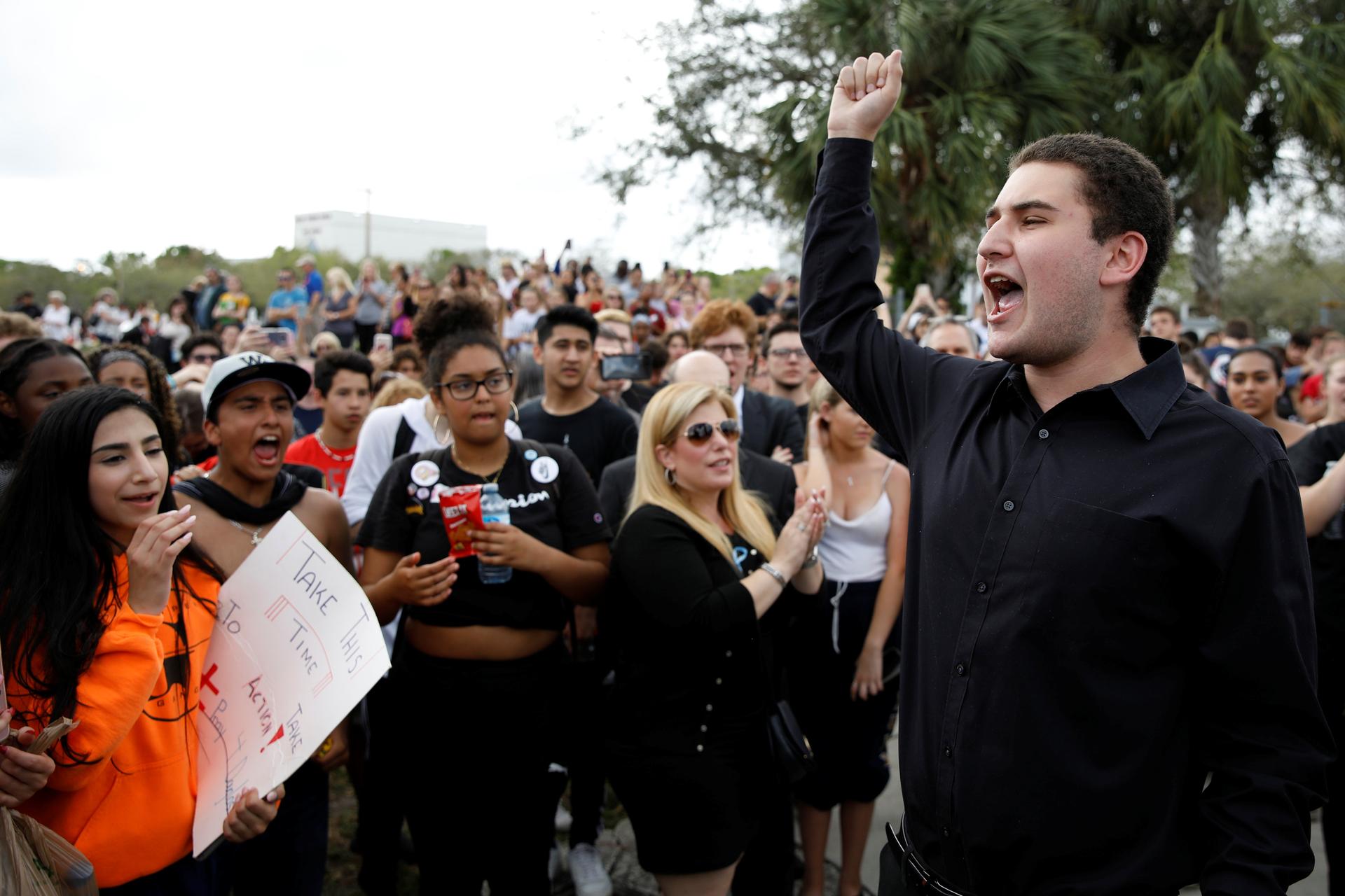 Student speaks to crowd at a protest