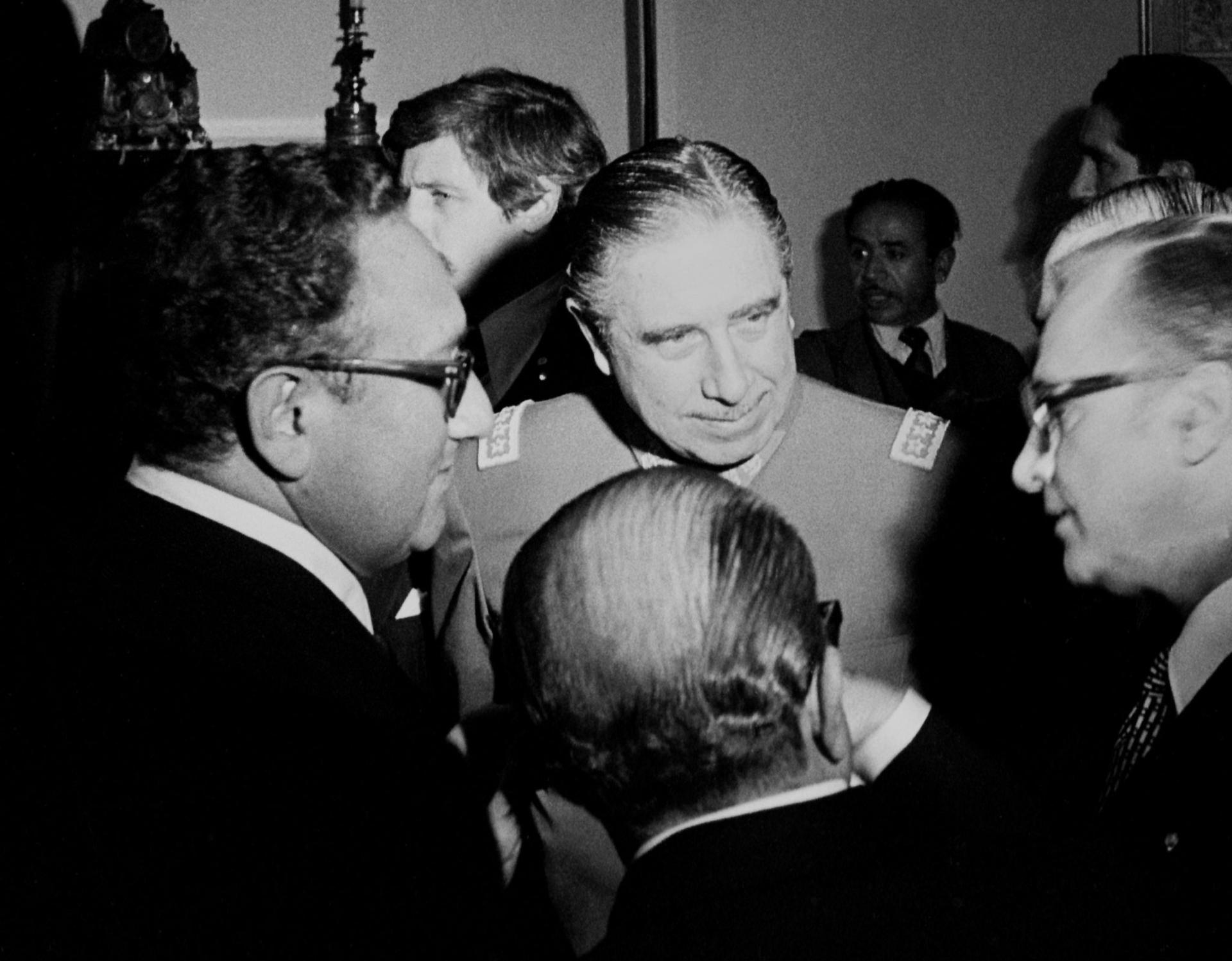 Former US Secretary of State Henry Kissinger and Chilean General Augusto Pinochet in an undated file photo.
