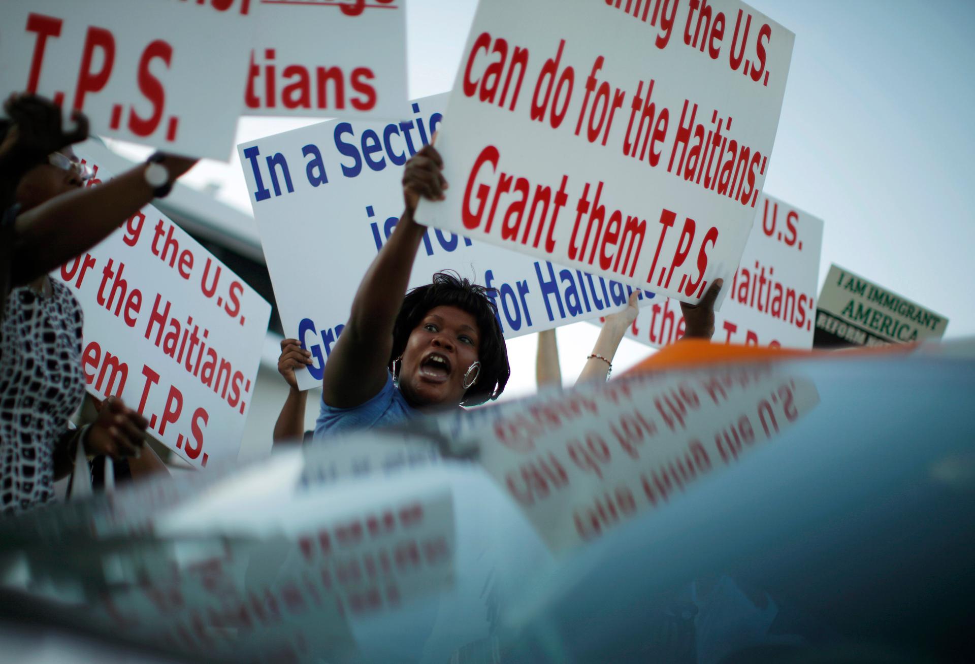 This is a rally in support of TPS for Haitian immigrants back in 2009, during a visit by former US President Barack Obama to Miami, Florida.