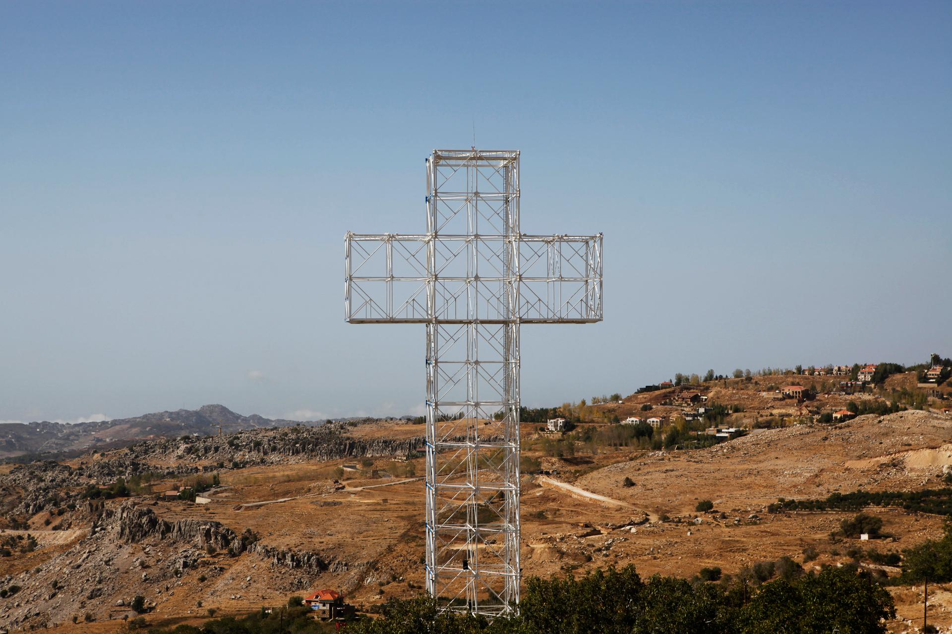 A giant cross stands on top of the Mount Qanat Bakish in Lebanon, in a photo from Oct. 1, 2010.