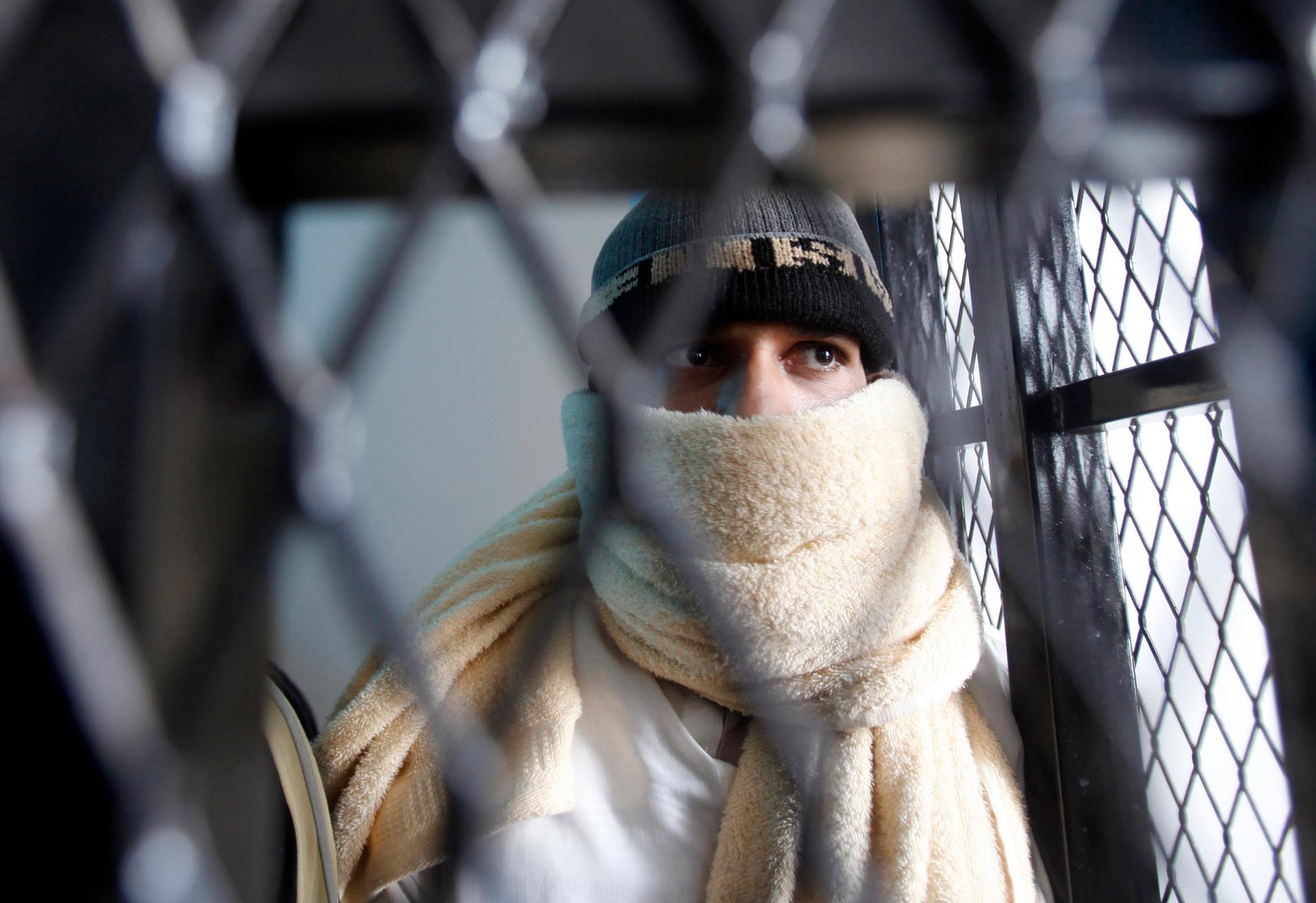 A suspected al-Qaeda militant waiting at the state security court of appeals in Sanaa in March, 2013.  Many young men in Yemen get swept up in security crackdowns and become radicalized in jail. 