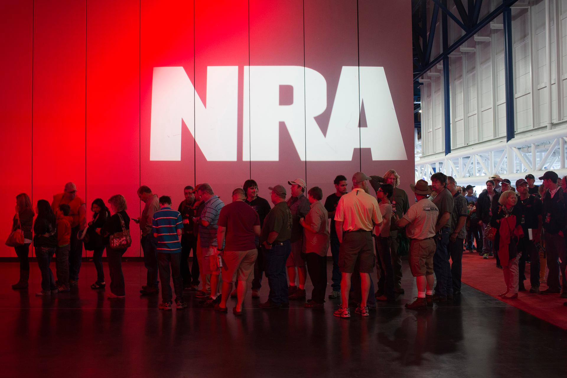 Attendees line up to meet musician Ted Nugent at a book signing event during the National Rifle Association's annual meeting in Houston, Texas, on May 5, 2013. 