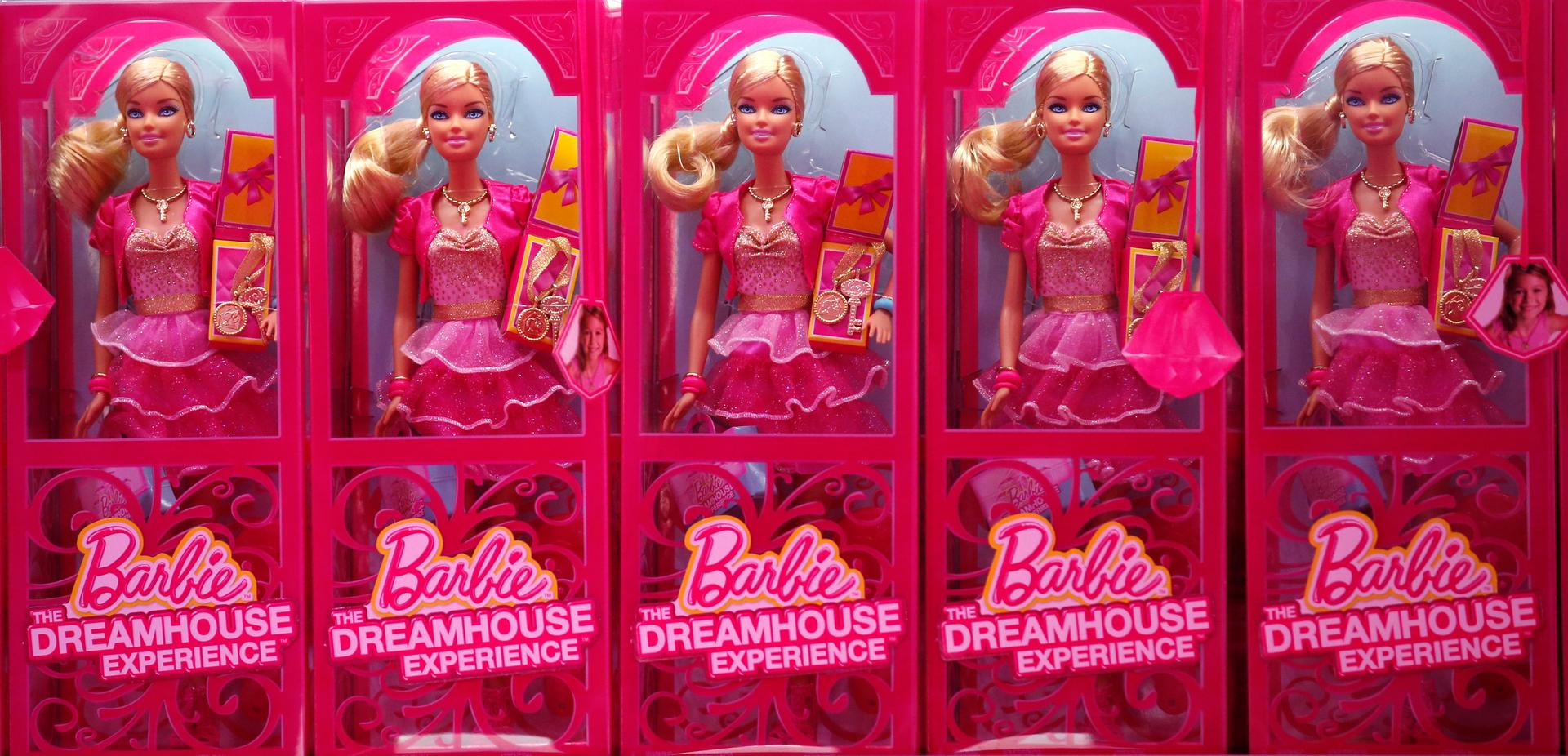 Mattel's Barbie dolls on sale are pictured inside a shop of a life-size "Barbie Dreamhouse" during a media tour in Berlin, May 15, 2013. 