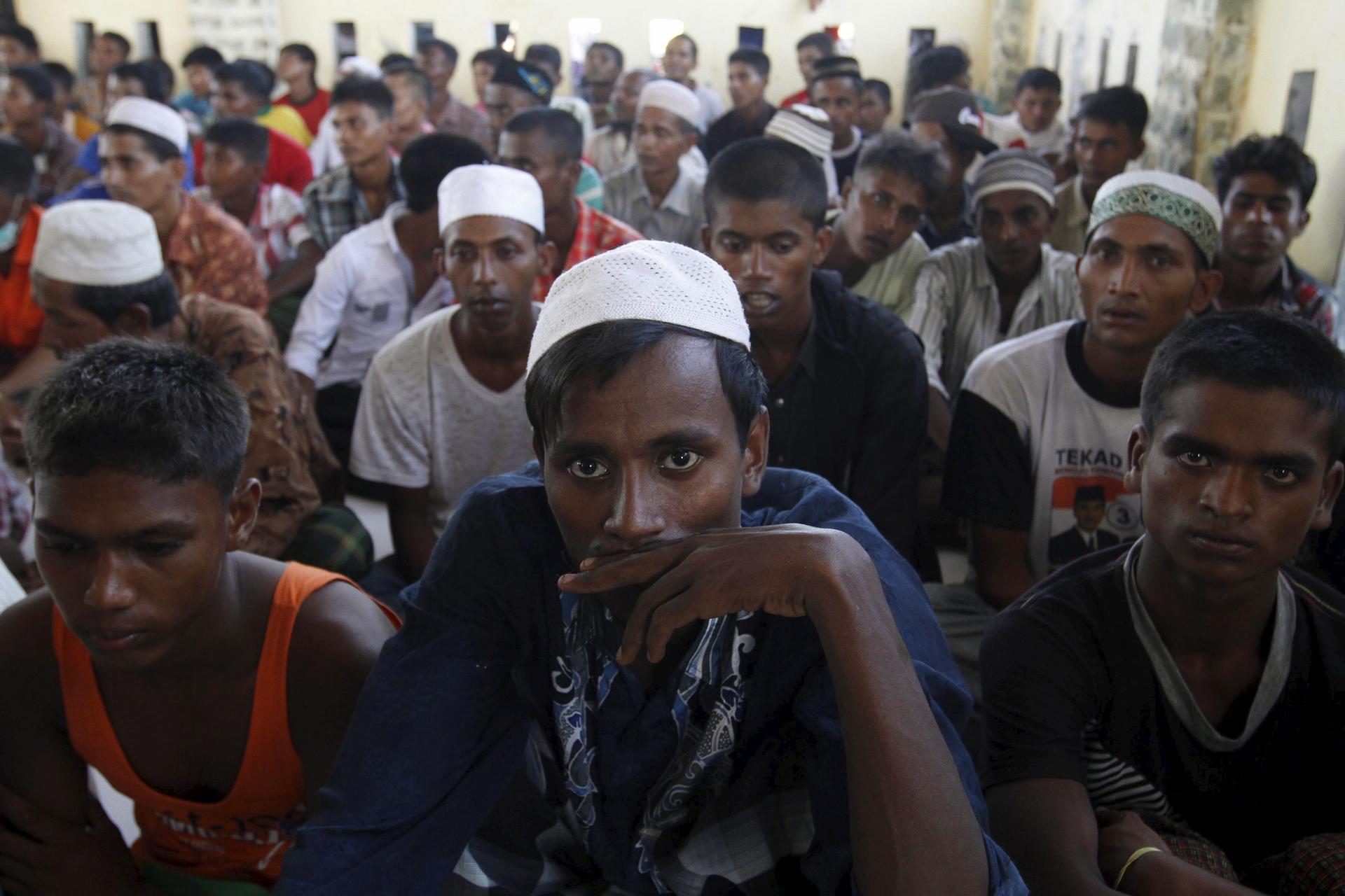 Some of the lucky ones: A group of Rohingya and Bangladeshi migrants admitted into Indonesia in May 2015. Thailand, Malaysia and Indonesia are now pushing away boats holding thousands of migrants.