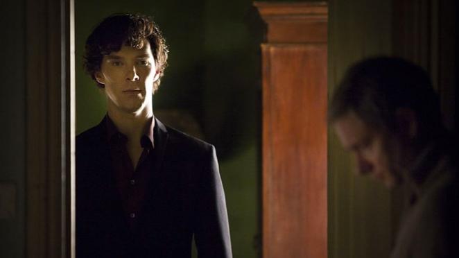 Benedict Cumberbatch as Sherlock Homes (L) and Martin Freeman as John Watson.