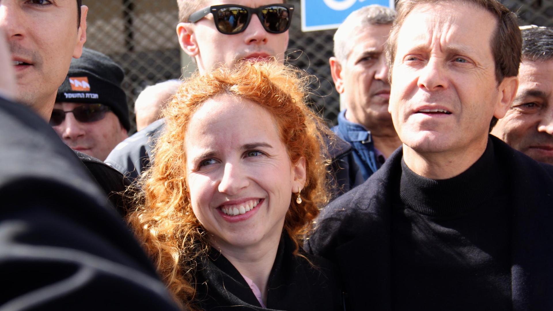Firebrand Israeli politician Stav Shaffir stands with Yitzhak Herzog, the chairman of Israel's Labor Party and fellow member of the Israeli parliament.
