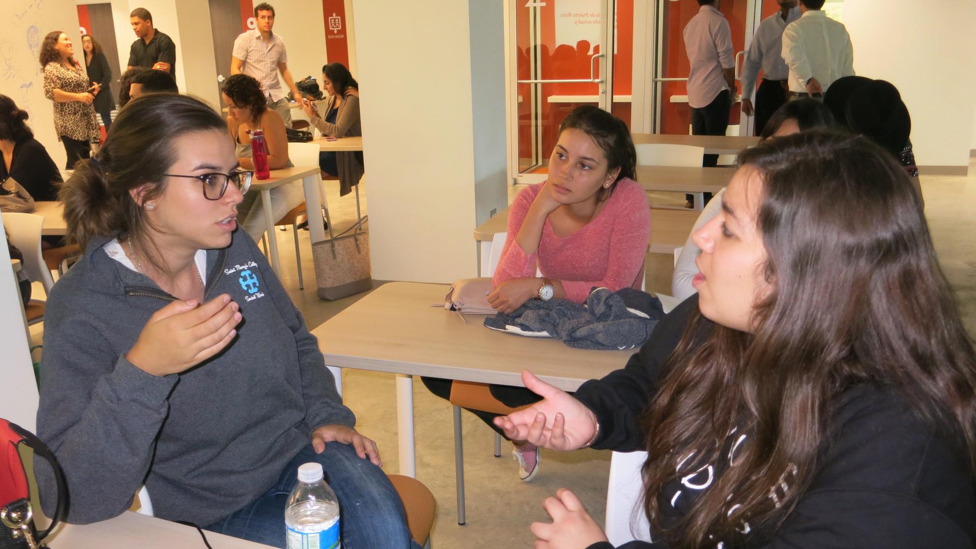 Puerto Rican college students Nina Croatto, Tatiana Rodríguez (middle), and Paulina Colón (right) are participating in the summer leadership program, "Puerto Rican Minds in Action." 