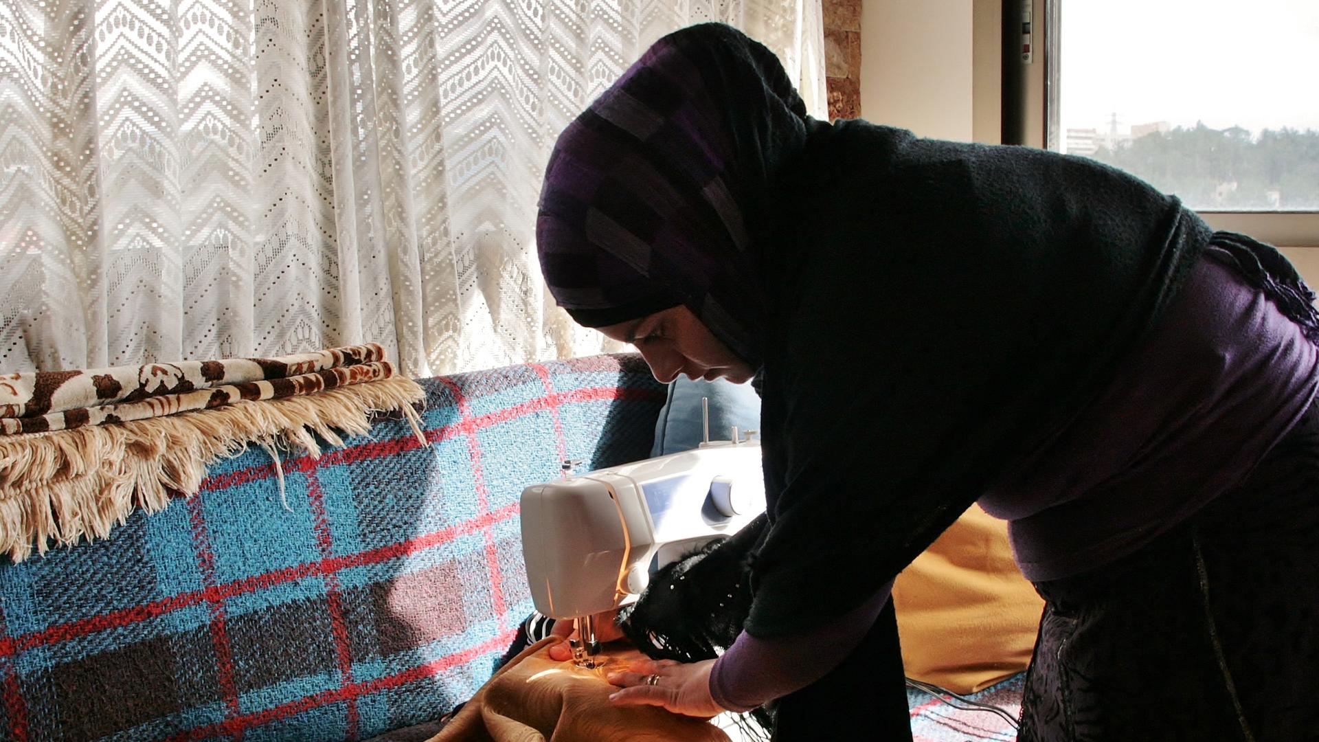 Hiba Bekai's office is her home, where she sews and does other needle work that she sells to Syrians and Lebanese.