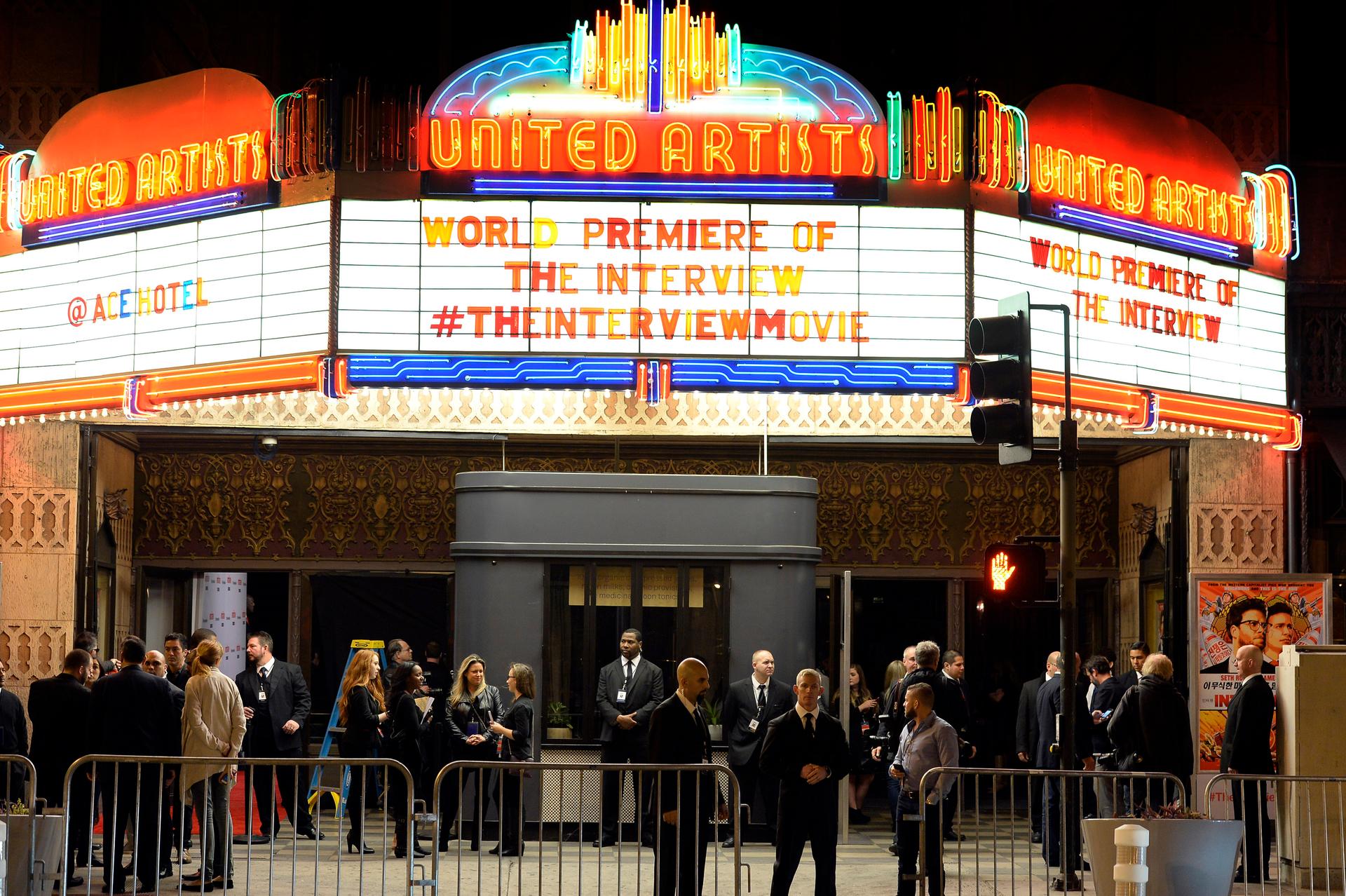 ​Security guards stand behind bicycle rails at the entrance of United Artists theater during premiere of the film "The Interview" in Los Angeles, California December 11, 2014.