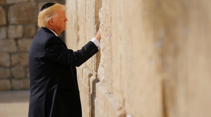 President Donald Trump places a note in the stones of the Western Wall, Judaism's holiest prayer site, in Jerusalem's Old City, on May 22.