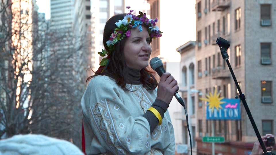 Lesya Pishchevskaya, from Ukraine, speaks at a rally in December near the Ukrainian consulate in San Francisco. Pishchevskaya, who works in the tech industry, is also part of MaydanSF, a local group supporting opposition-led protests back home.