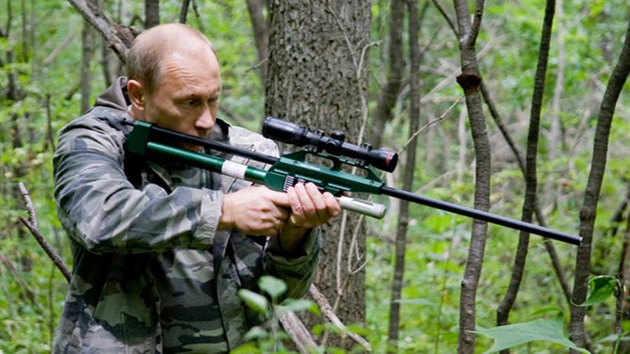 Vladimir Putin uses a tranquilizer gun to sedate an Amur Tiger during his visit to a nature reserve in eastern Russia.