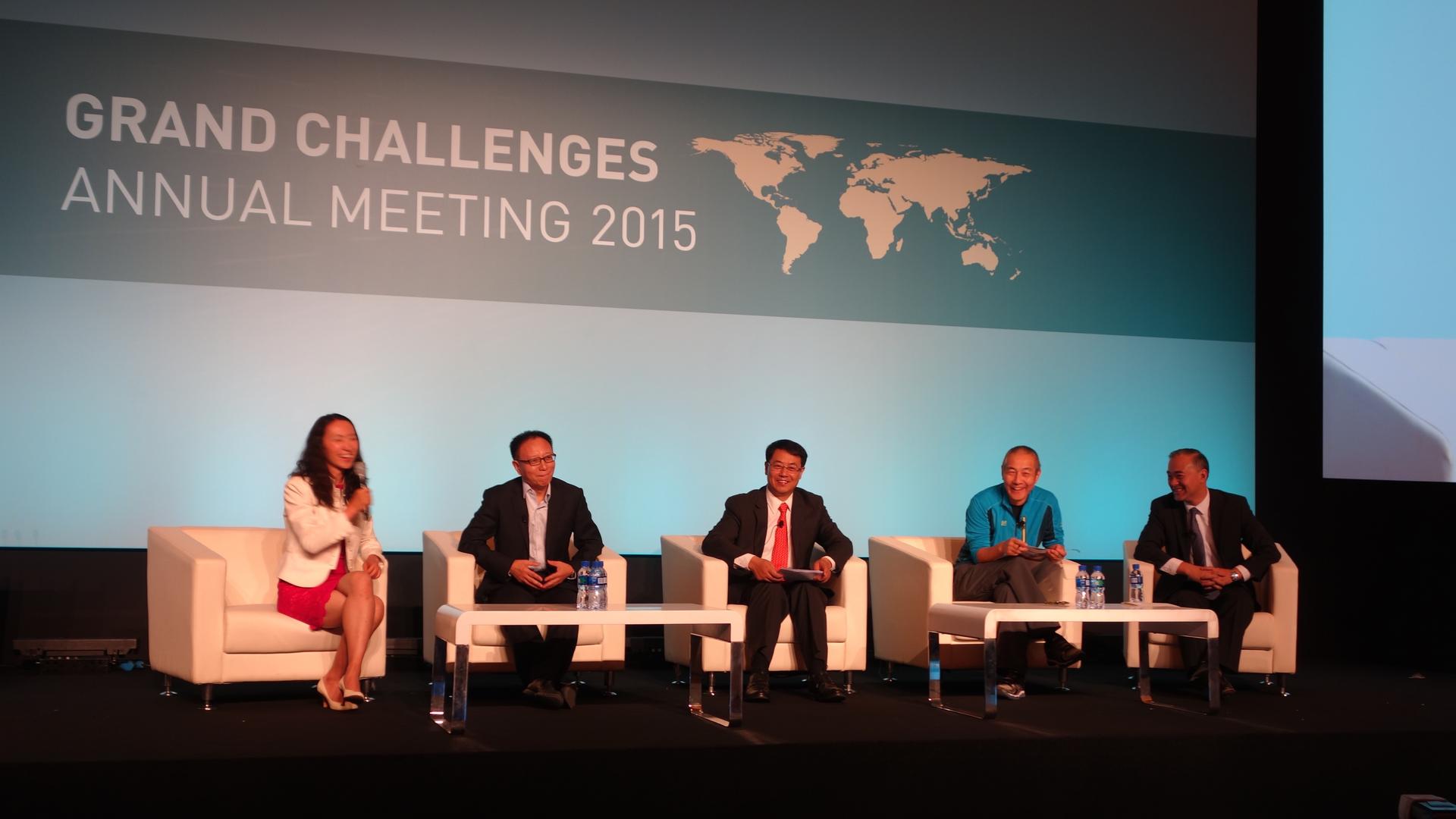 BGI founder Wang Jian, in athletic jacket, joins other panelists at Grand Challenges talk in Beijing