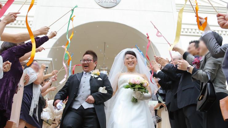 An LGBT couple in Japan celebrate their nuptials.
