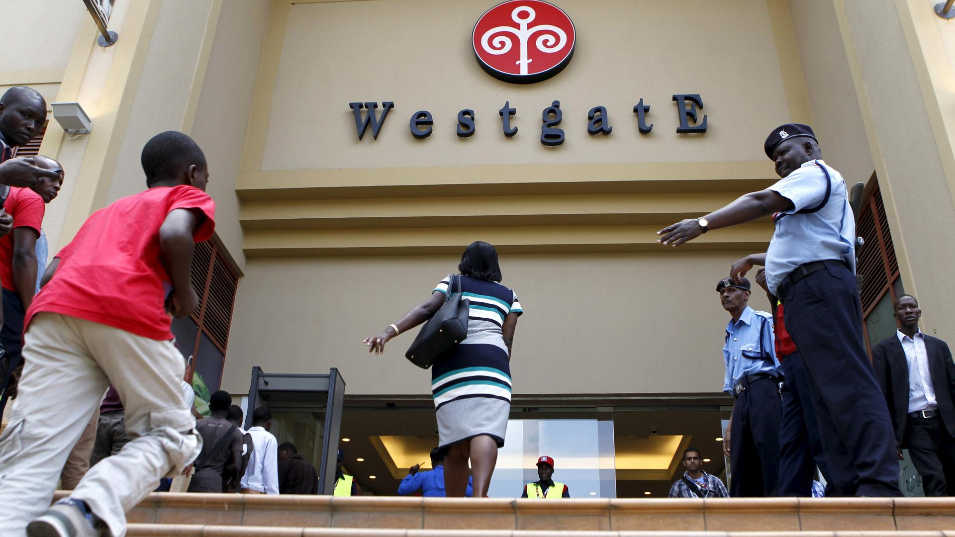 Customers enter the re-opened Westgate shopping mall, in Kenya's capital Nairobi, July 18, 2015. Kenya's Westgate shopping mall reopened for the first time since al Shabaab gunmen stormed the mall killing at least 67 people in September 2013.