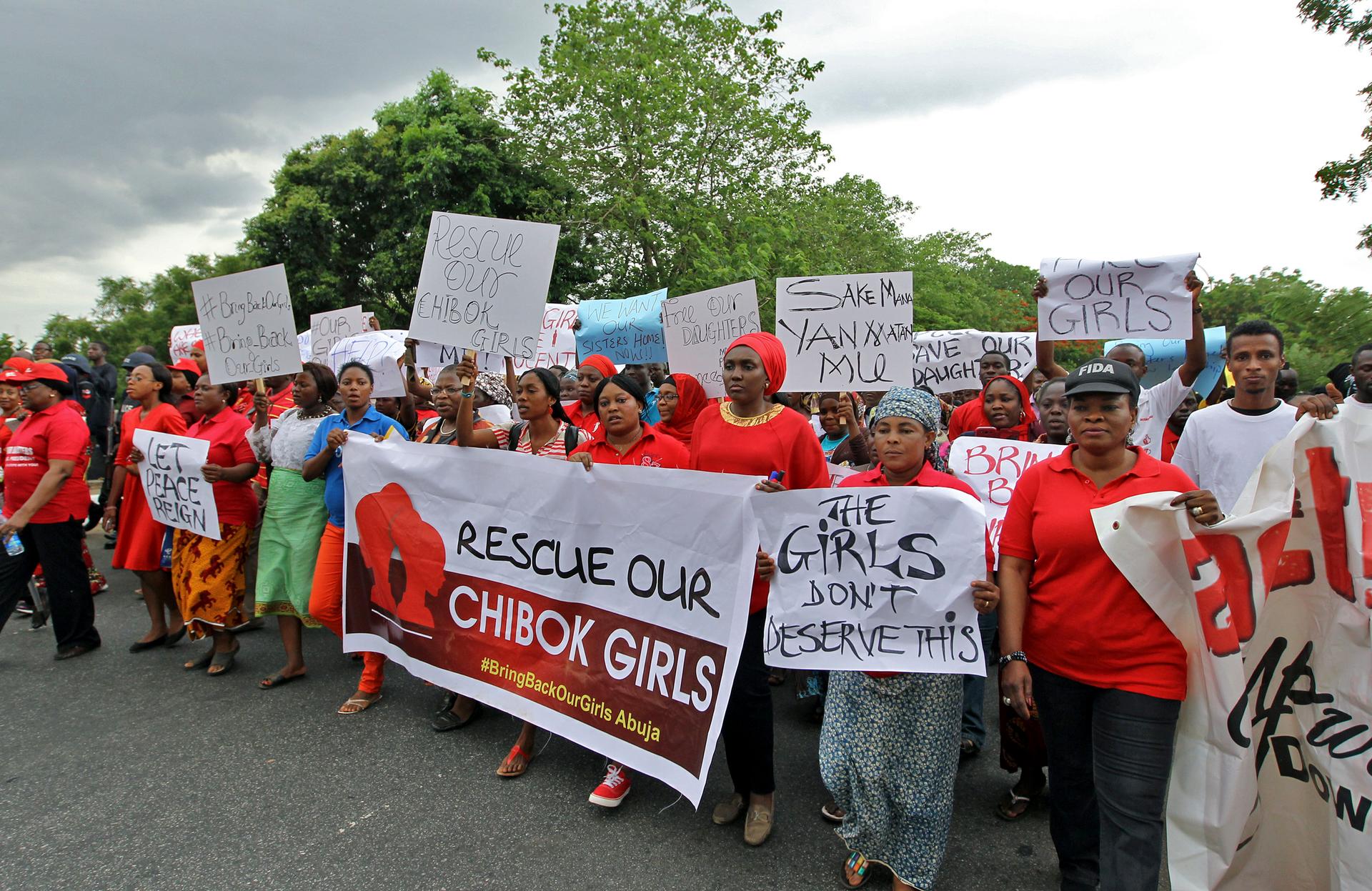 Members of various civil society organizations (CSOs) protest against the delay in securing the release of the abducted schoolgirls who were kidnapped. Dozens of protesters gathered outside Nigeria's parliament in Abuja on Wednesday called on security for