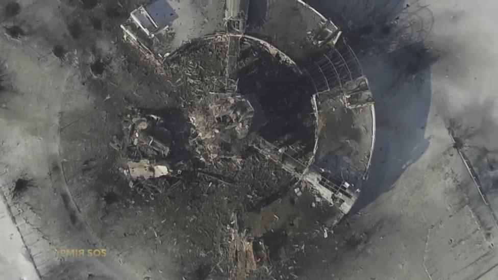 An aerial photograph taken by a drone shows the air traffic control tower of the Sergey Prokofiev International Airport damaged by shelling during fighting between pro-Russian separatists and Ukrainian government forces in eastern Ukraine.