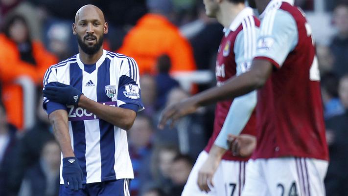 West Bromwich Albion's French striker Nicolas Anelka gestures as he celebrates scoring their second goal during the English Premier League football match.