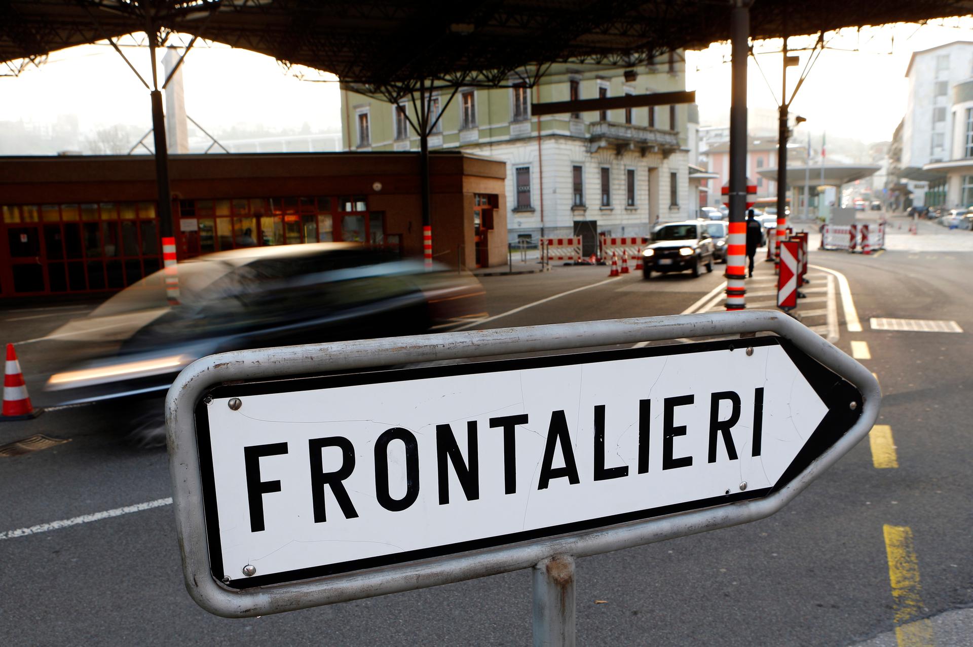 A traffic sign is pictured at the Swiss-Italian border in Chiasso