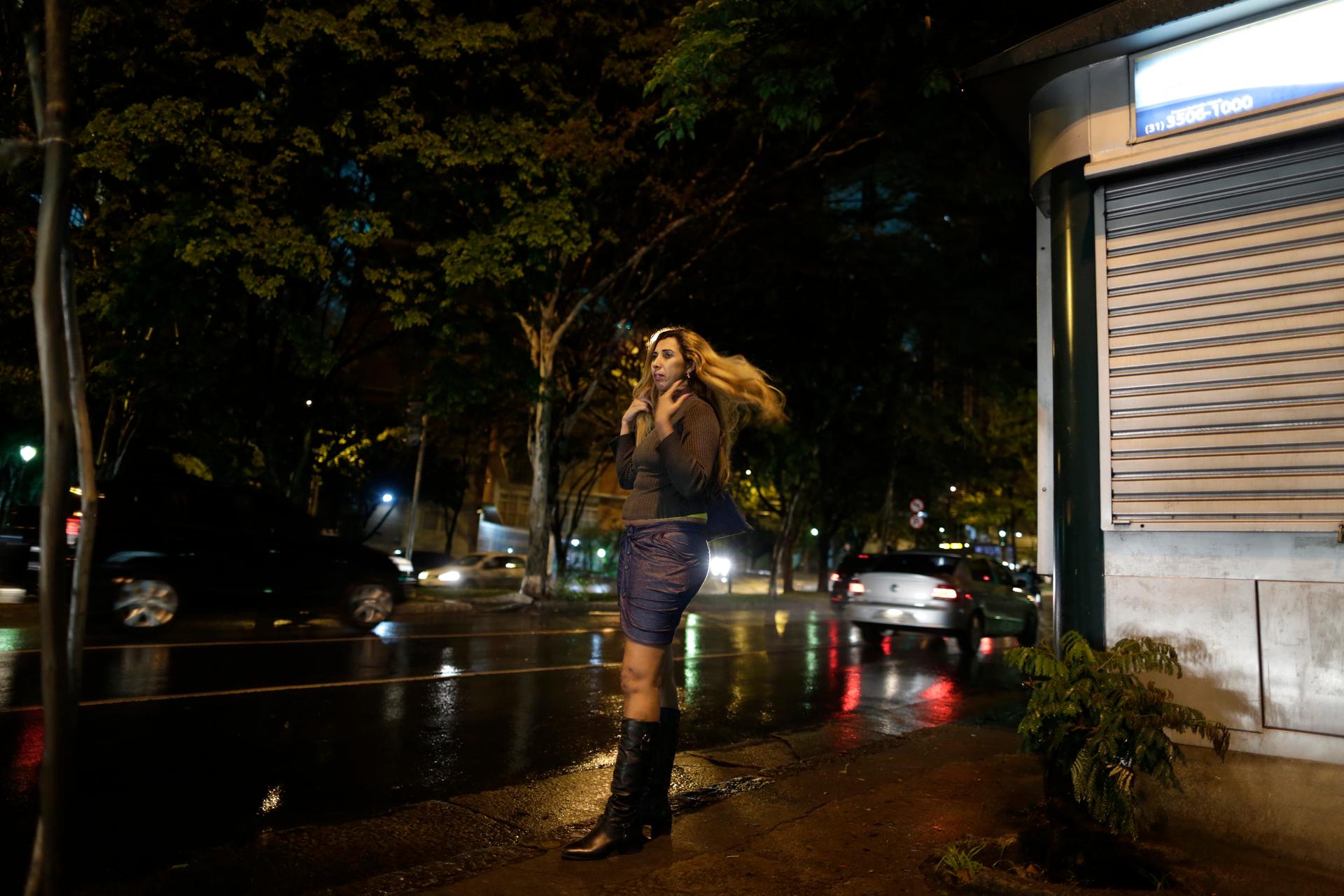 Cida Vieira, president of the Association of Prostitutes of Minas Gerais, looks for clients along a street in Belo Horizonte, November 5, 2013. A group of sex workers are taking English classes once a week in preparation for the World Cup. 