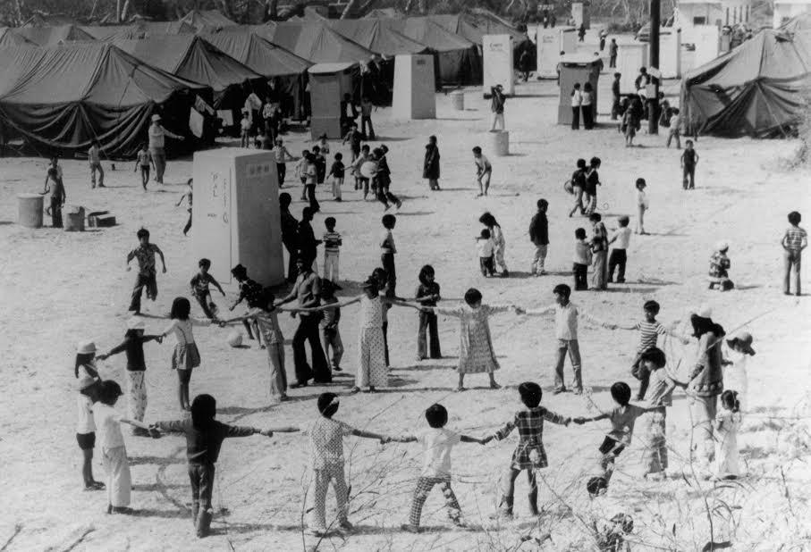With the help of the military and civilian aid groups, Vietnamese refugees at California's Camp Pendleton created a community after being resettled there in 1975. They received food, shelter and services to help prepare them for permanent residence in the