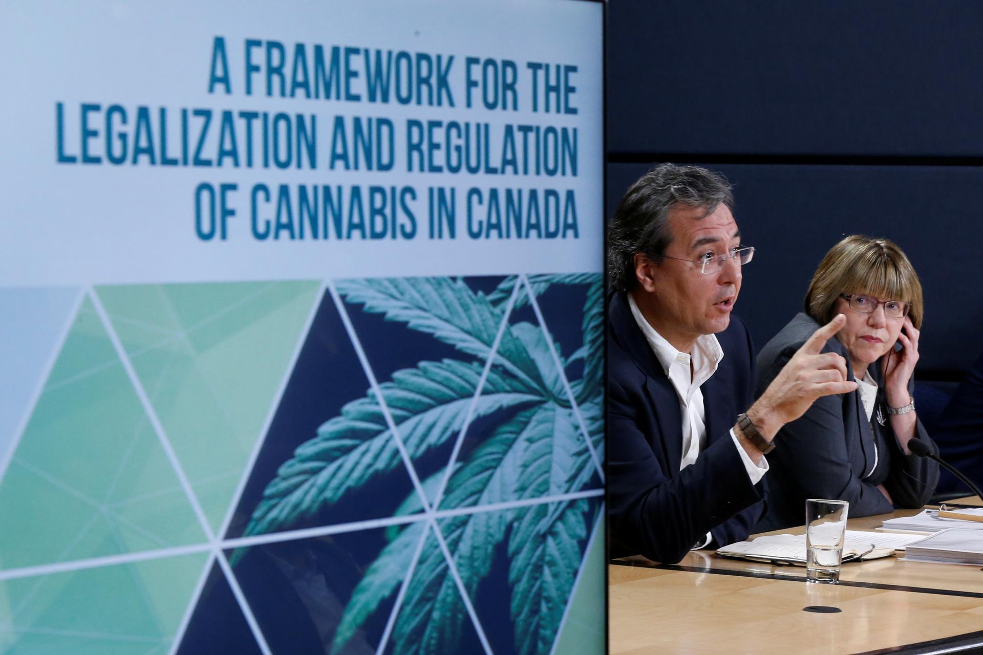 Anne McLellan, Chair of the Task Force on Cannabis Legalization and Regulation, and Vice Chair Mark Ware take part in a news conference in Ottawa, Ontario, Canada December 13, 2016.