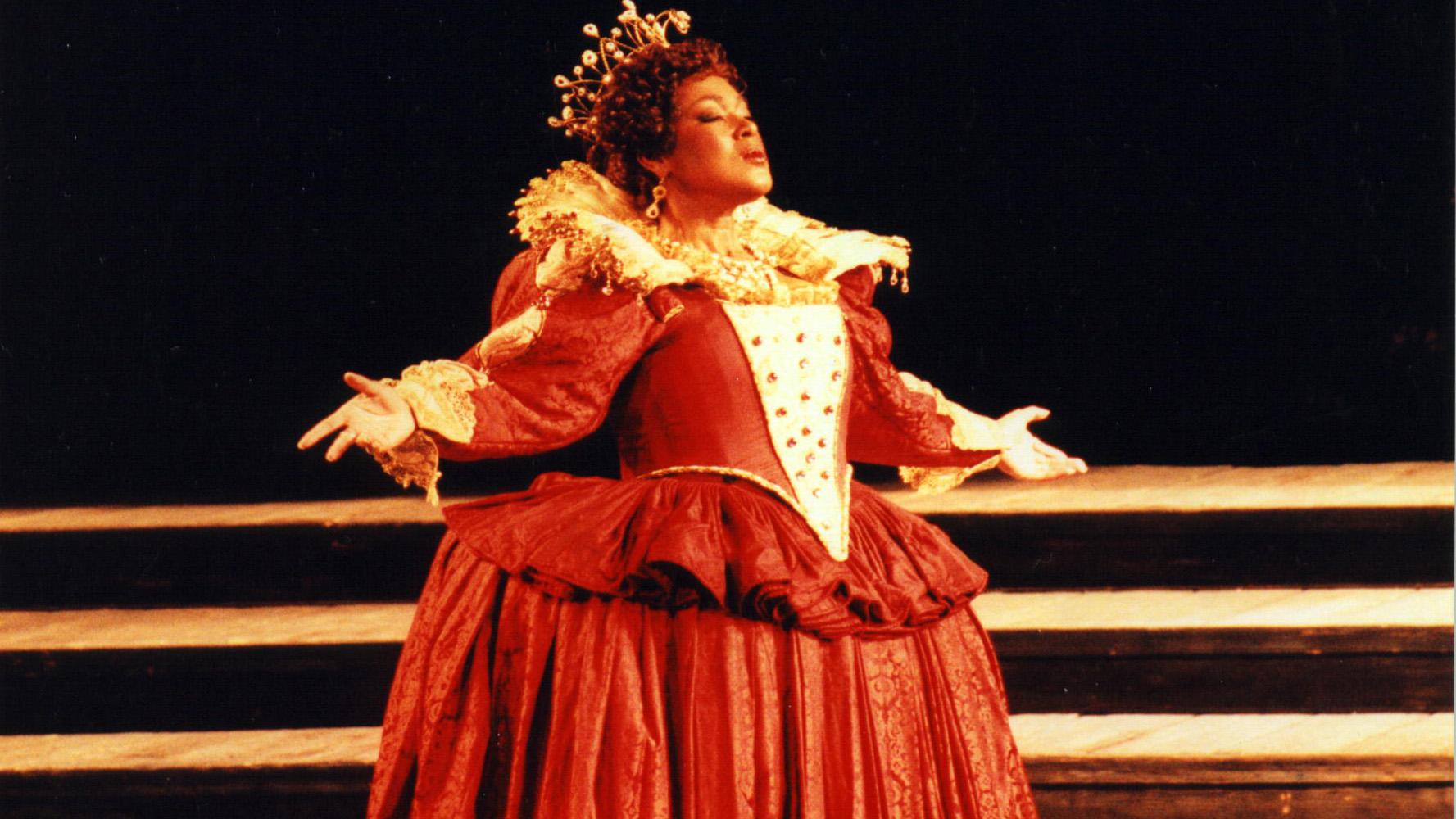Mezzo soprano Carolyn Sebron performs as Queen Elizabeth I in the opera Maria Stuarda at the Monte Carlo Opera (1997). 