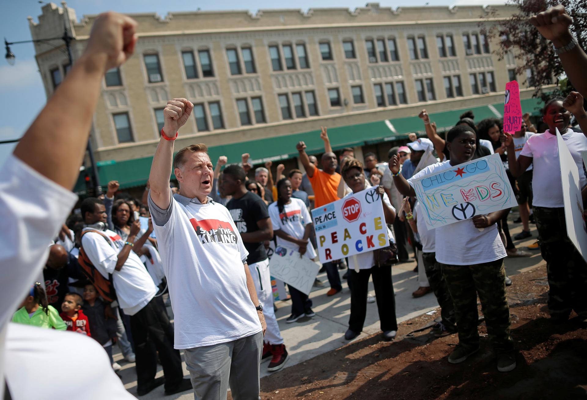 Father Michael Pfleger takes part in an anti-violence peace demonstration
