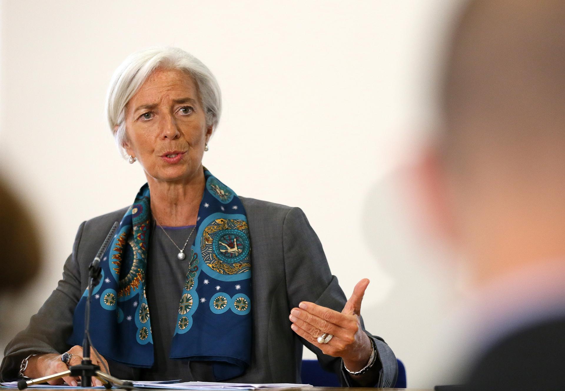 IMF Managing Director Christine Lagarde prepares to host a news conference at the Treasury, in London June 6, 2014. IMF Managing Director Christine Lagarde ruled herself out of the running for the job of European Commission president on Friday.