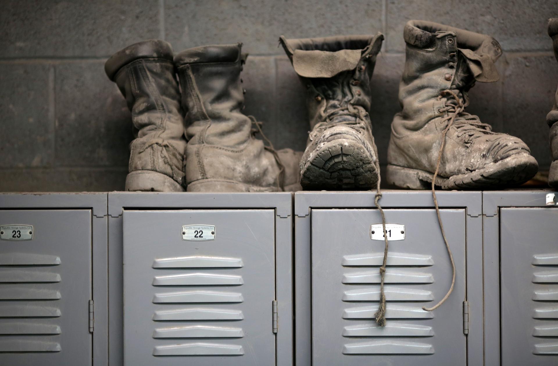 Coal mining boots are shown above miners' lockers