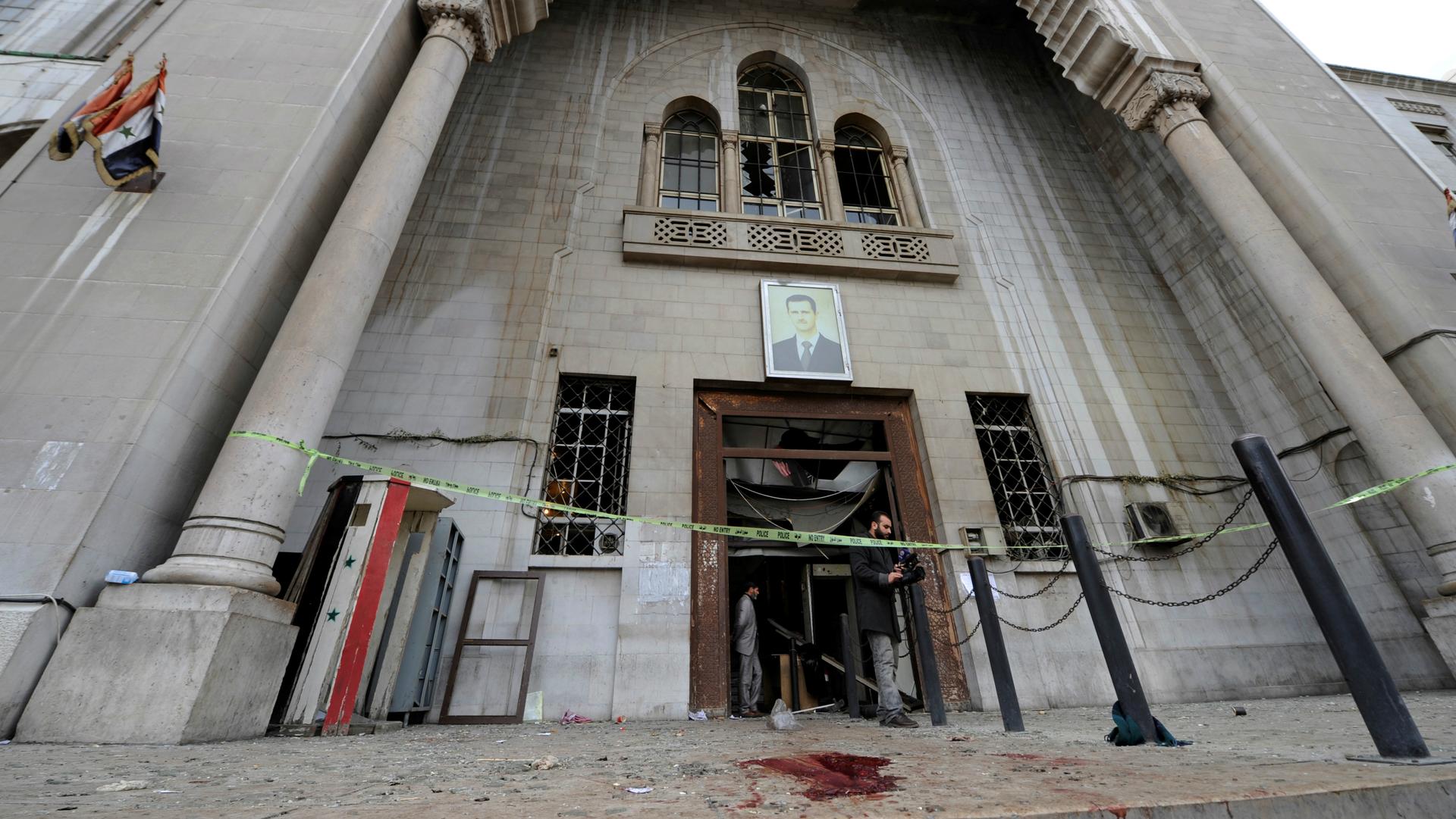 The entrance of the Palace of Justice in Damascus, Syria, after a suicide bomber killed dozens there on March 15, 2017.