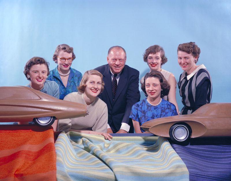 Six of GM's "Damsels of Design," photographed circa 1955. From left: Suzanne Vanderbilt, Ruth Glennie, Marjorie Ford Pohlman, Harley Earl, Jeanette Linder, Sandra Logyear, Peggy Sauer.