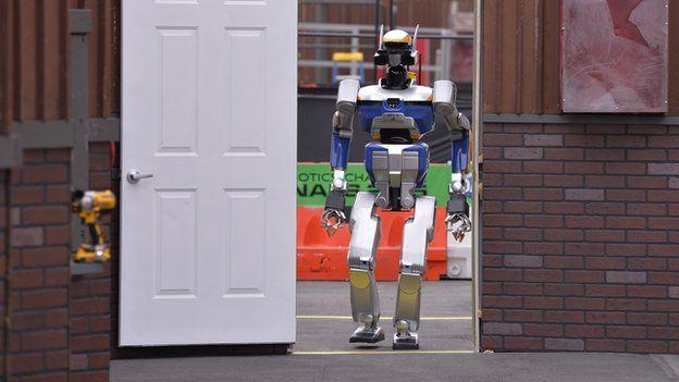 Team Aist-Nedo's HRP2+ robot was able to open a door at the DARPA Robotics Challenge.