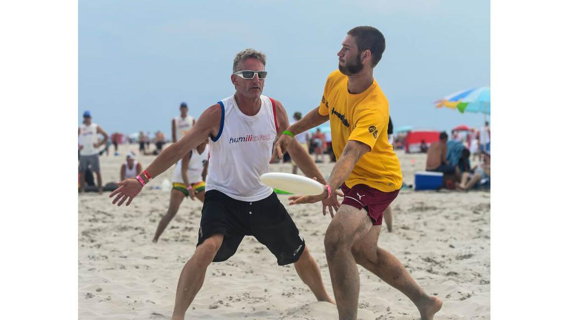 Patrick van der Valk (l) playing at Wildwood Tournament - The World's Largest Beach Ultimate Tournament