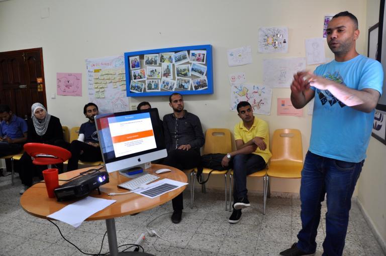 Said Hassan, manager of Gaza Sky Geeks, advises entrepreneurs at the group's pre-investment "boot camp."