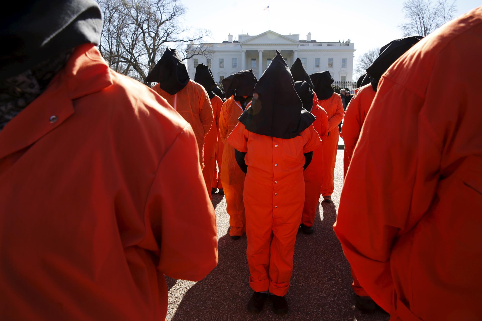 Protesters from Amnesty International USA and other organizations rally outside the White House to demand the closure of the US prison at Guantanamo Bay, on Jan. 11, 2016. 