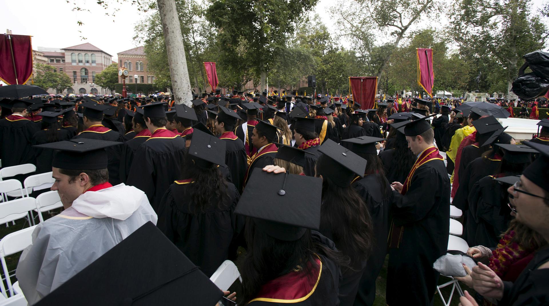 Graduating students attend USC's Commencement Ceremony at the University of Southern California in Los Angeles, California, May 15, 2015.