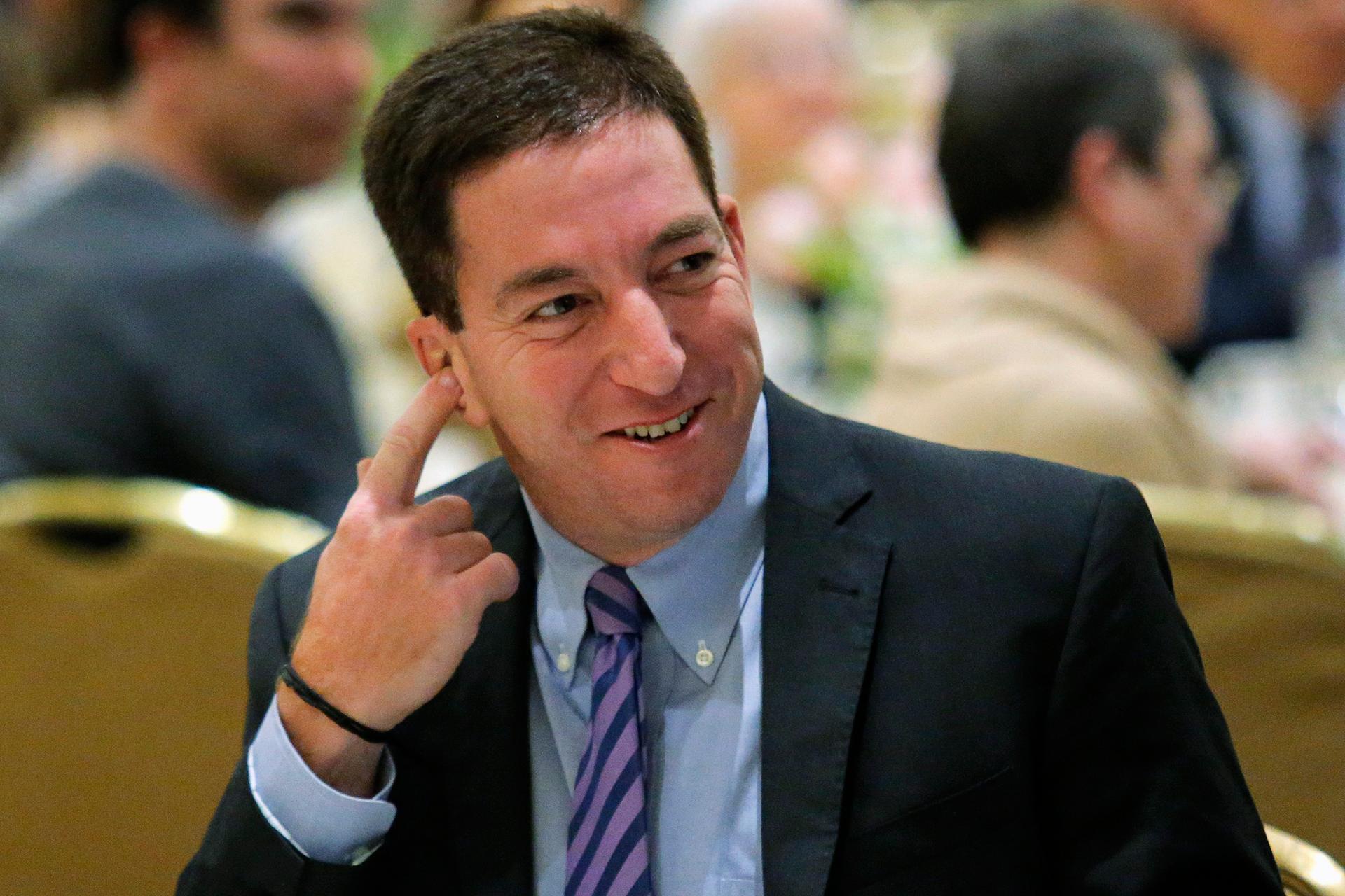 Glenn Greenwald attends the George Polk Awards in New York, April 11, 2014. Greenwald and Laura Poitras, the U.S. journalists who reported on spy agency analyst Edward Snowden's leaks exposing mass government surveillance, returned to the United States on