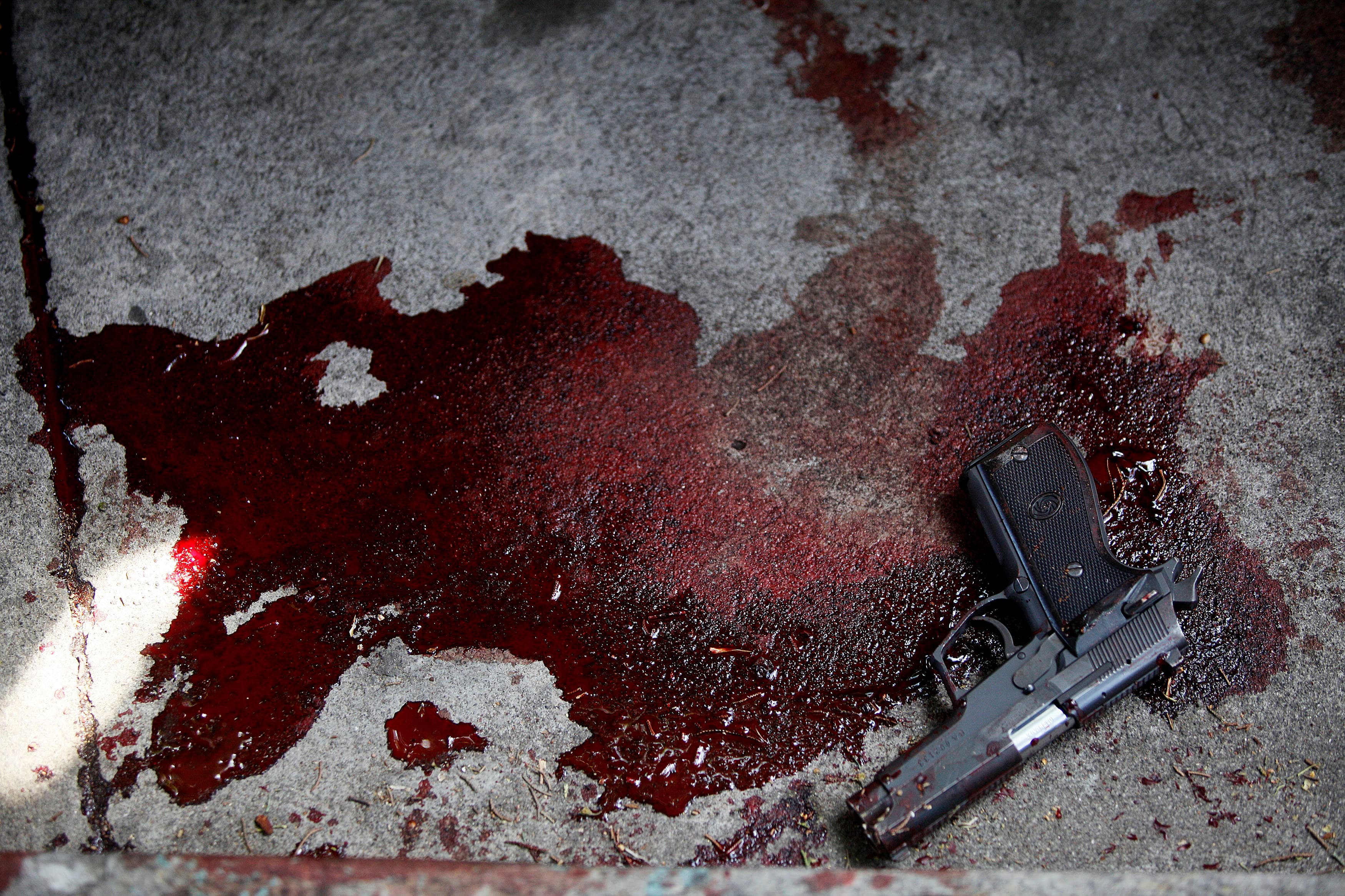 Gun in blood