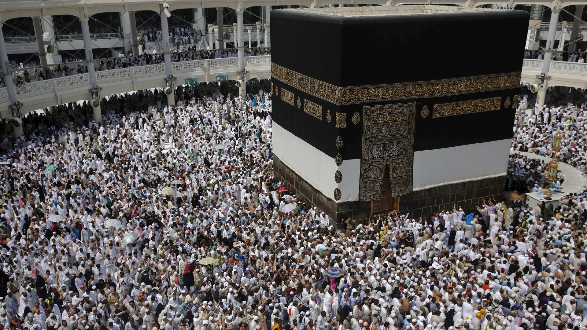Muslim pilgrims pray around the holy Kaaba at the Grand Mosque ahead of the annual Hajj pilgrimage in Mecca.