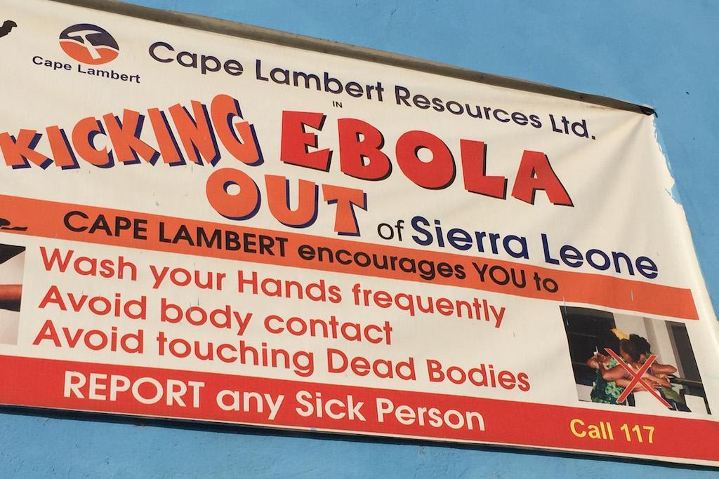 One of many banners around Freetown, Sierra Leone, warning people not to touch one another because of Ebola.