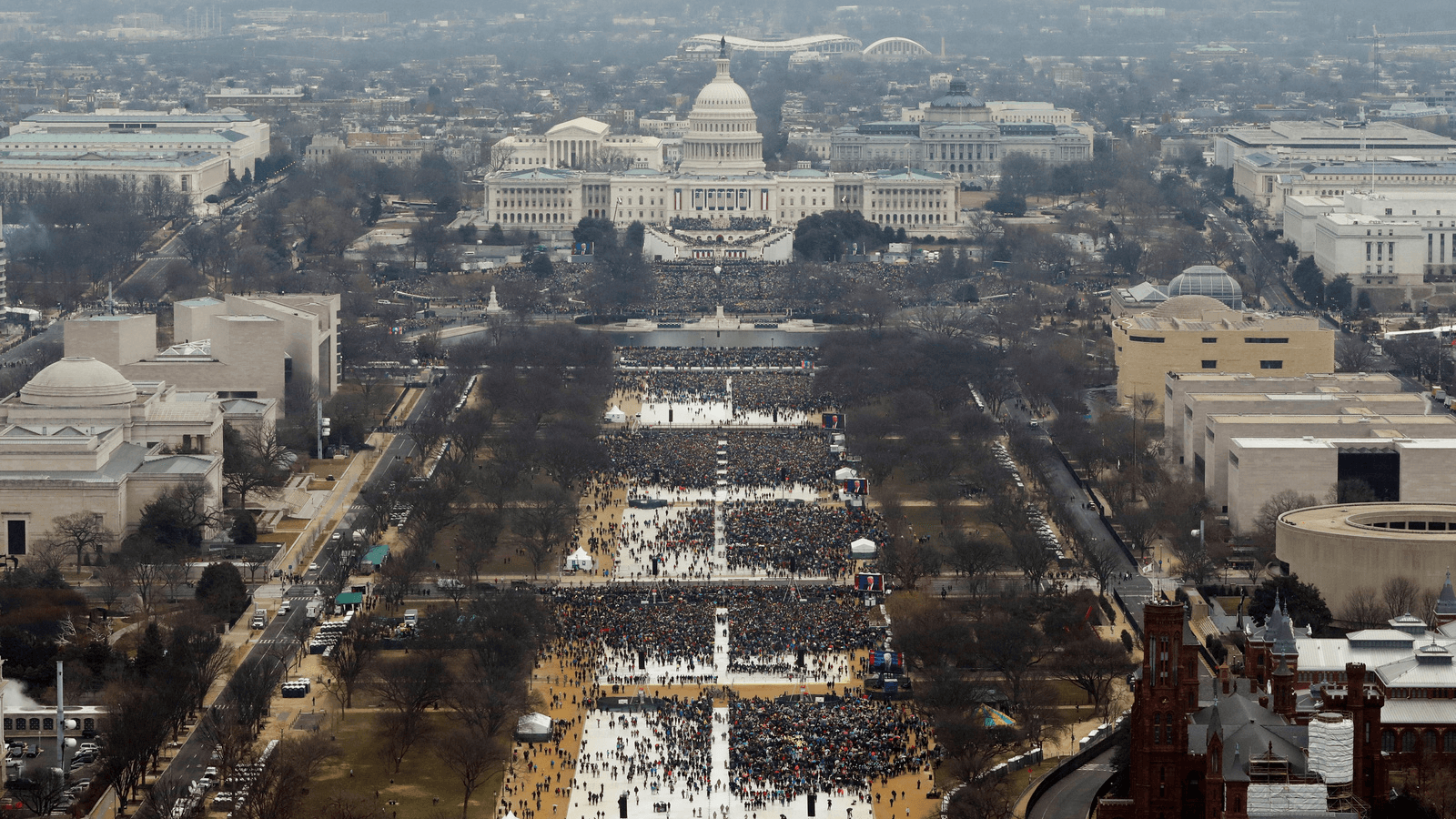 Attendees partake in the inauguration ceremonies to swear in Donald Trump as the 45th president of the United States at the US Capitol in Washington, Jan. 20, 2017. 
