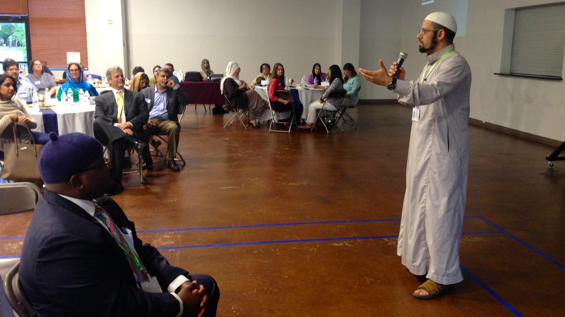 Imam Islam Mossaad speaks at a recent "Ramadan Open House" event at the North Austin Muslim Community Center in the Texas capital. 