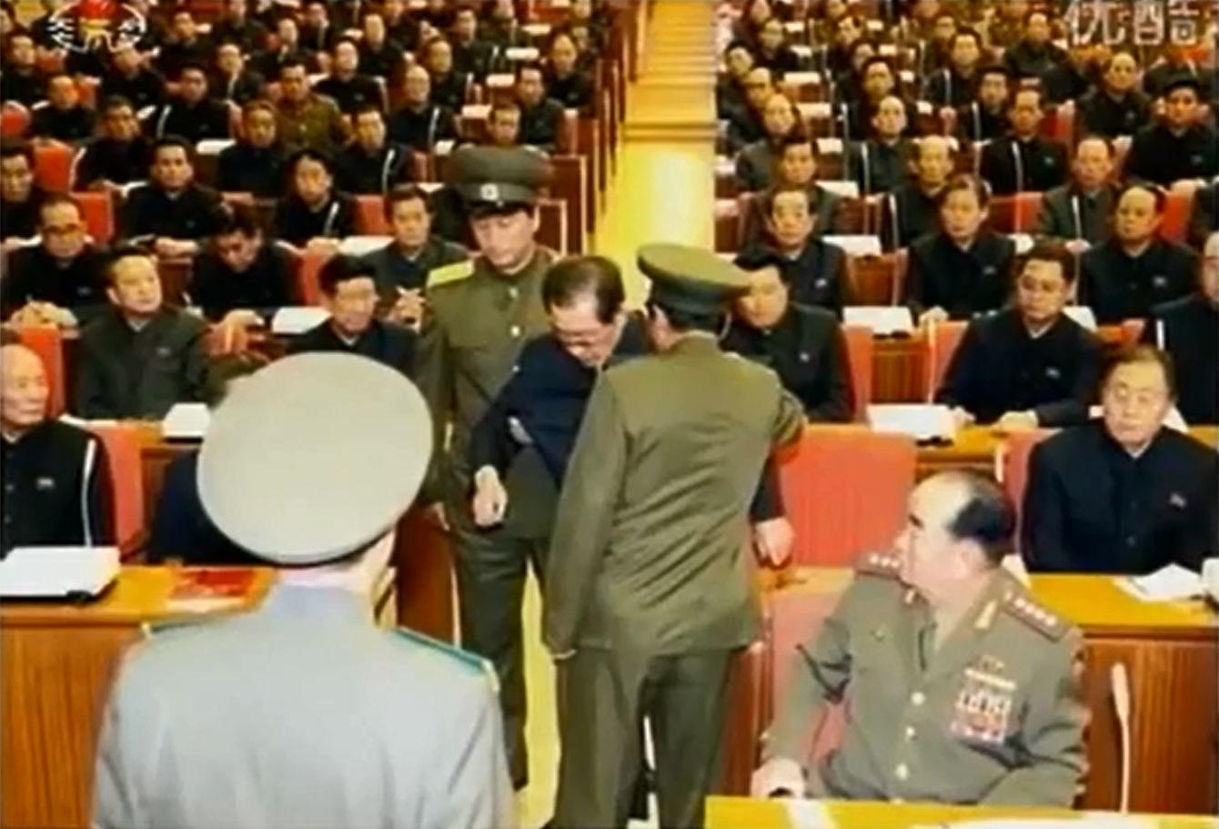 The moment of Jang Song Thaek's arrest, after he was denounced in the middle of a party meeting.