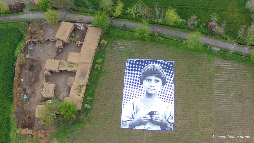 An artist collective erected this photo exhibit in Pakistan to remind drone operators that their targets are real people.