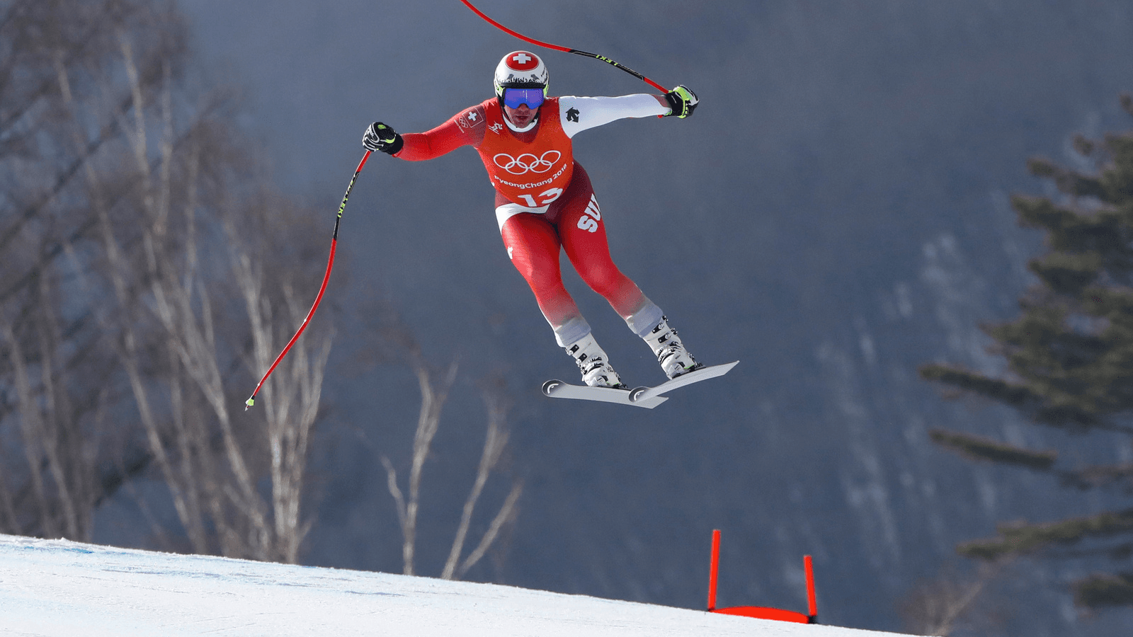 Beat Feuz of Switzerland takes a jump during the second training run for the men's downhill of the Pyeongchang 2018 Winter Olympic Games at the Jeongseon Alpine Centre in Pyeongchang, South Korea, Feb. 9, 2018.  