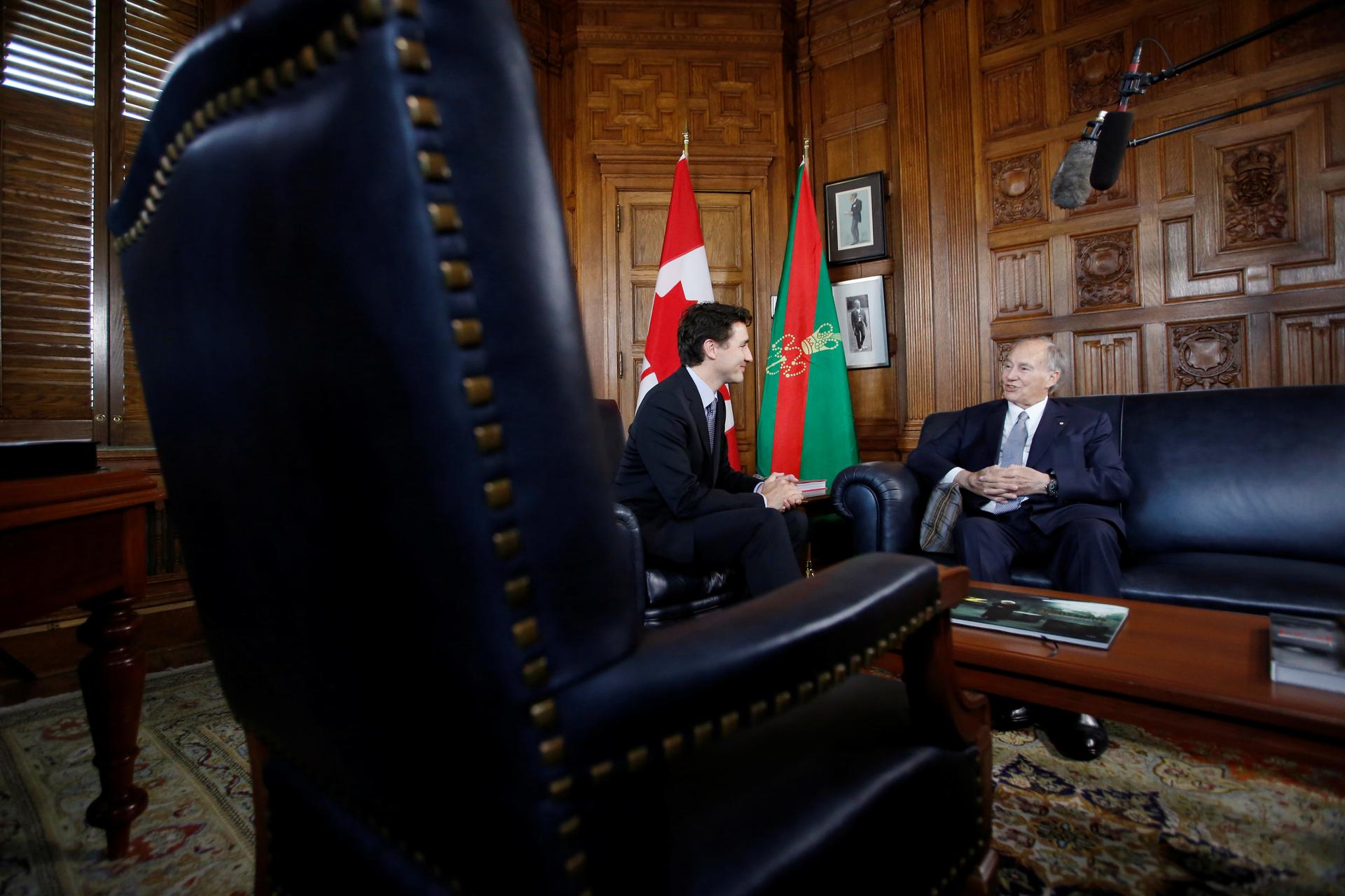 Canada's Prime Minister Justin Trudeau, left, meets with the Aga Khan