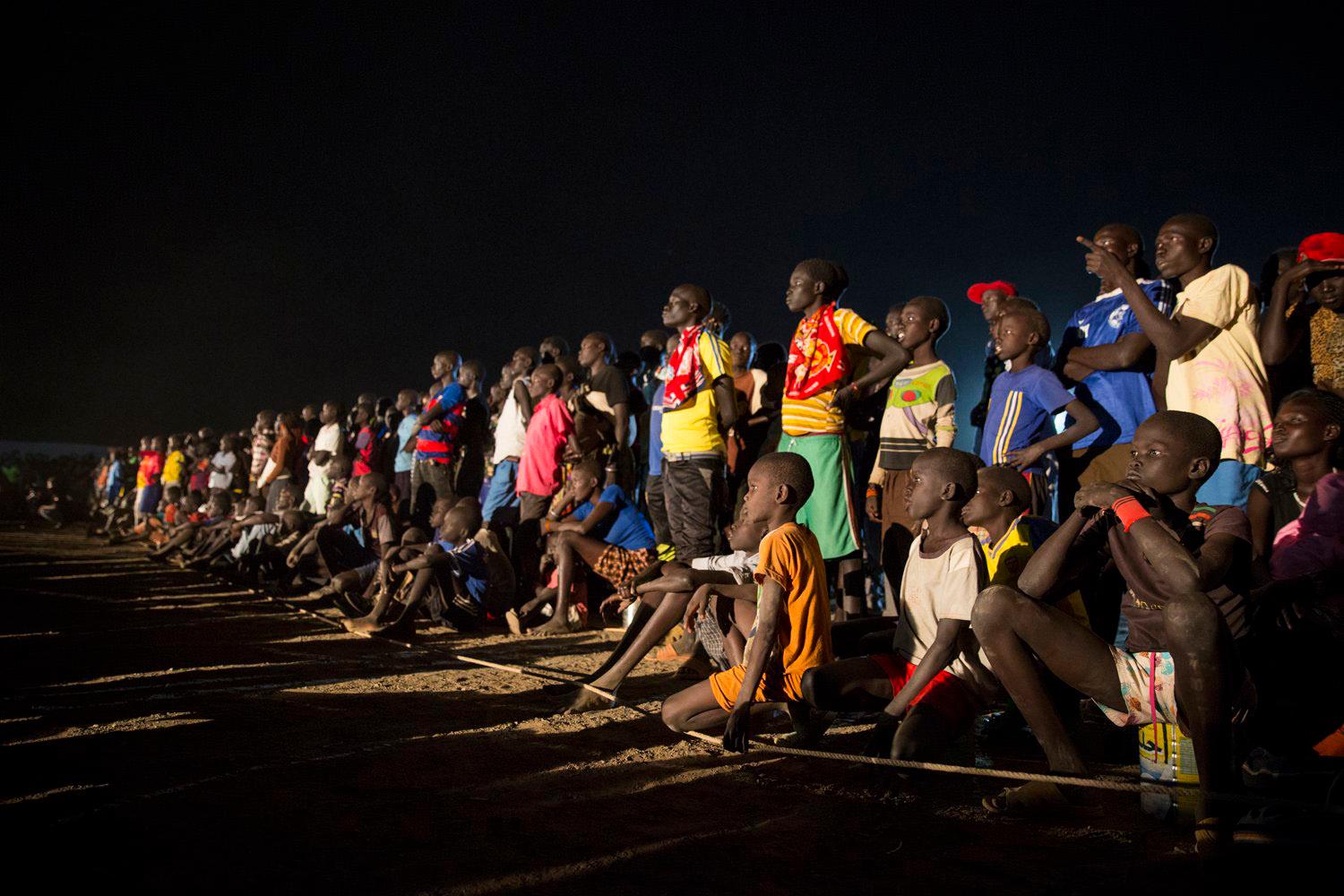 Refugees at Kakuma camp in Kenya watch the Olympics.