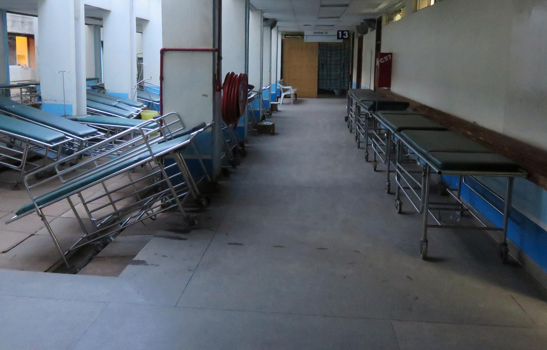 Medical stretchers are seen abandoned along the corridors at the main hospital during a strike