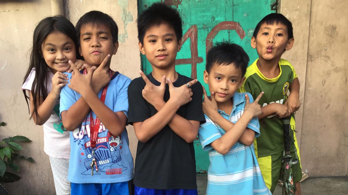 Kids posing for a photo in the Eastern Samar province of the Philippines